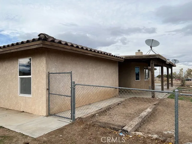 a view of backyard with large trees