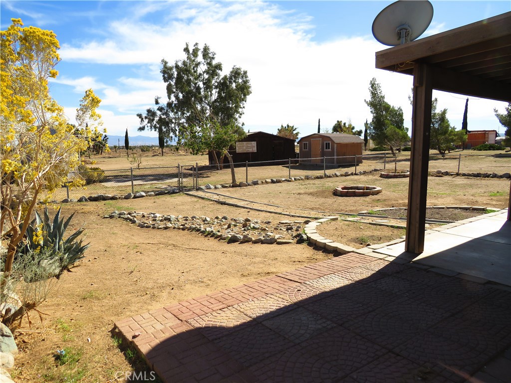 9951 Arrowhead Road Phelan, CA 92371 - Photo 6 of 21 a view of a backyard of the house