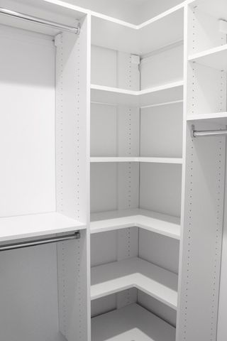 a view of an empty walk in closet