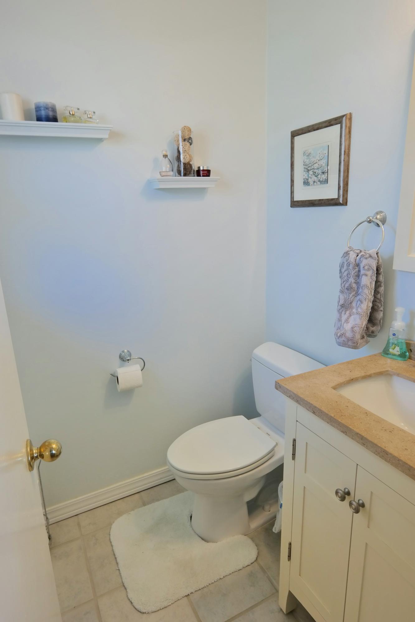 5726 Cove Road Roanoke, VA 24019 - Photo 16 of 34 a bathroom with a toilet and a sink