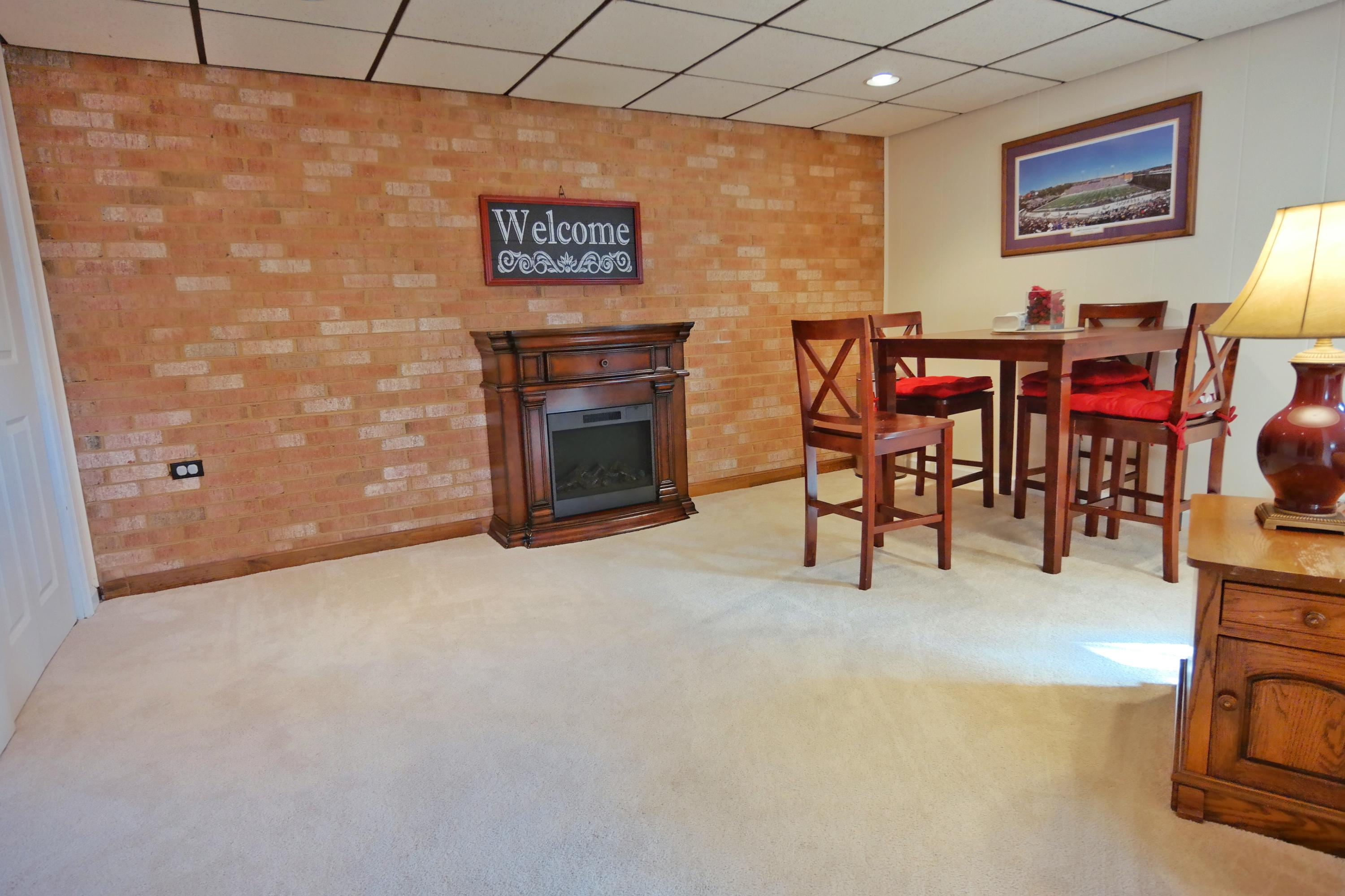 5726 Cove Road Roanoke, VA 24019 - Photo 22 of 34 a view of livingroom with furniture and fireplace