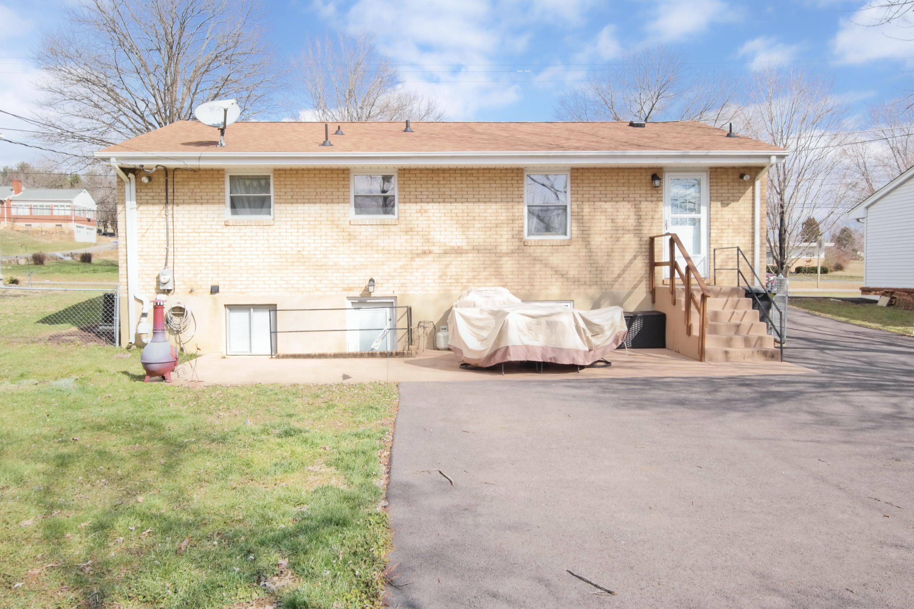 5726 Cove Road Roanoke, VA 24019 - Photo 29 of 34 a front view of a house with a yard and garage