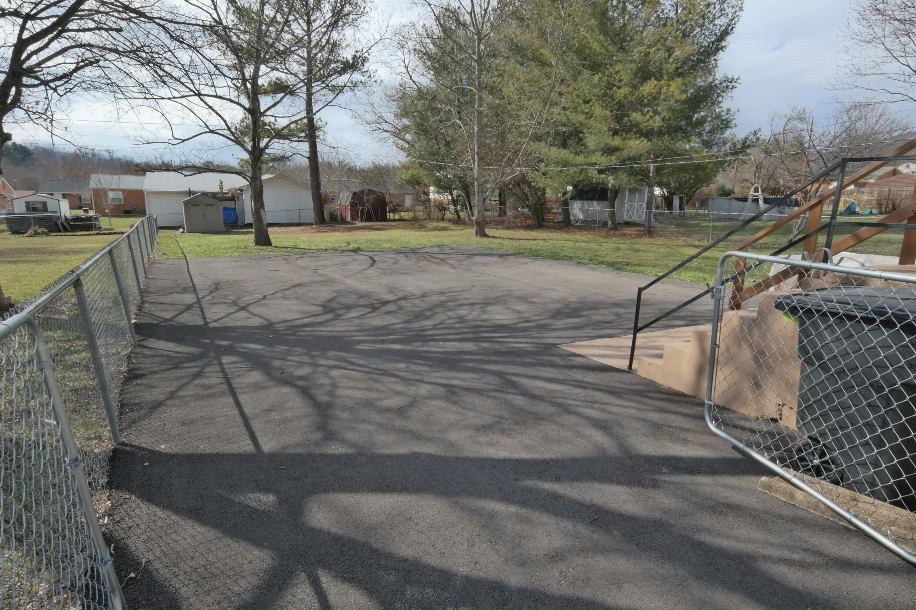 5726 Cove Road Roanoke, VA 24019 - Photo 32 of 34 a view of outdoor space with deck and trees