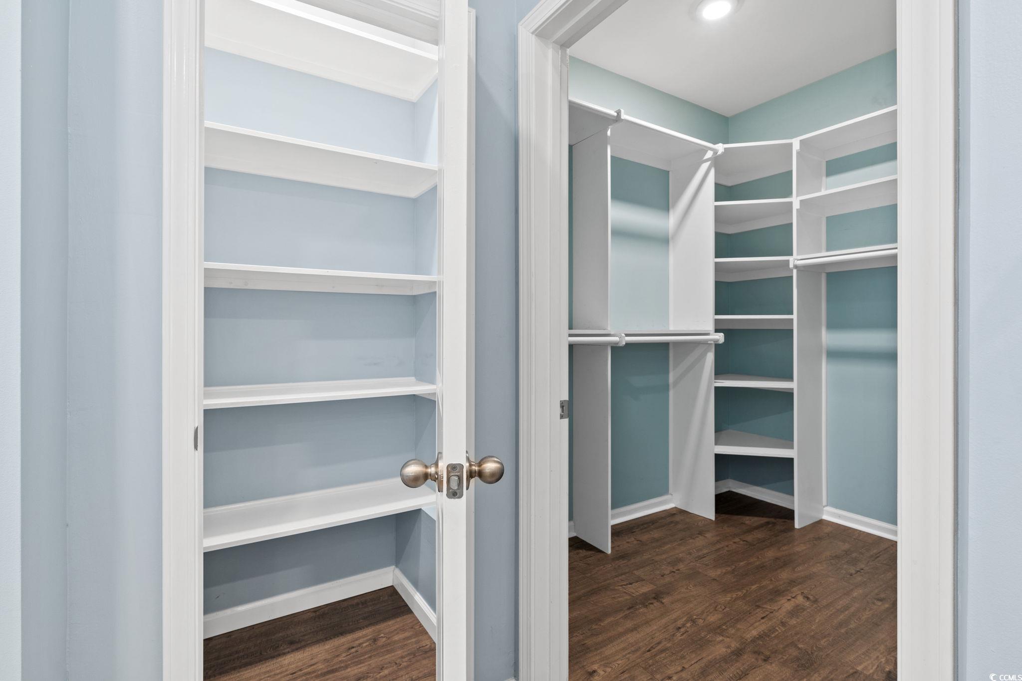 797 Salerno Circle, Unit C Myrtle Beach, SC 29579 - Photo 19 of 40 Spacious closet with dark wood-type flooring