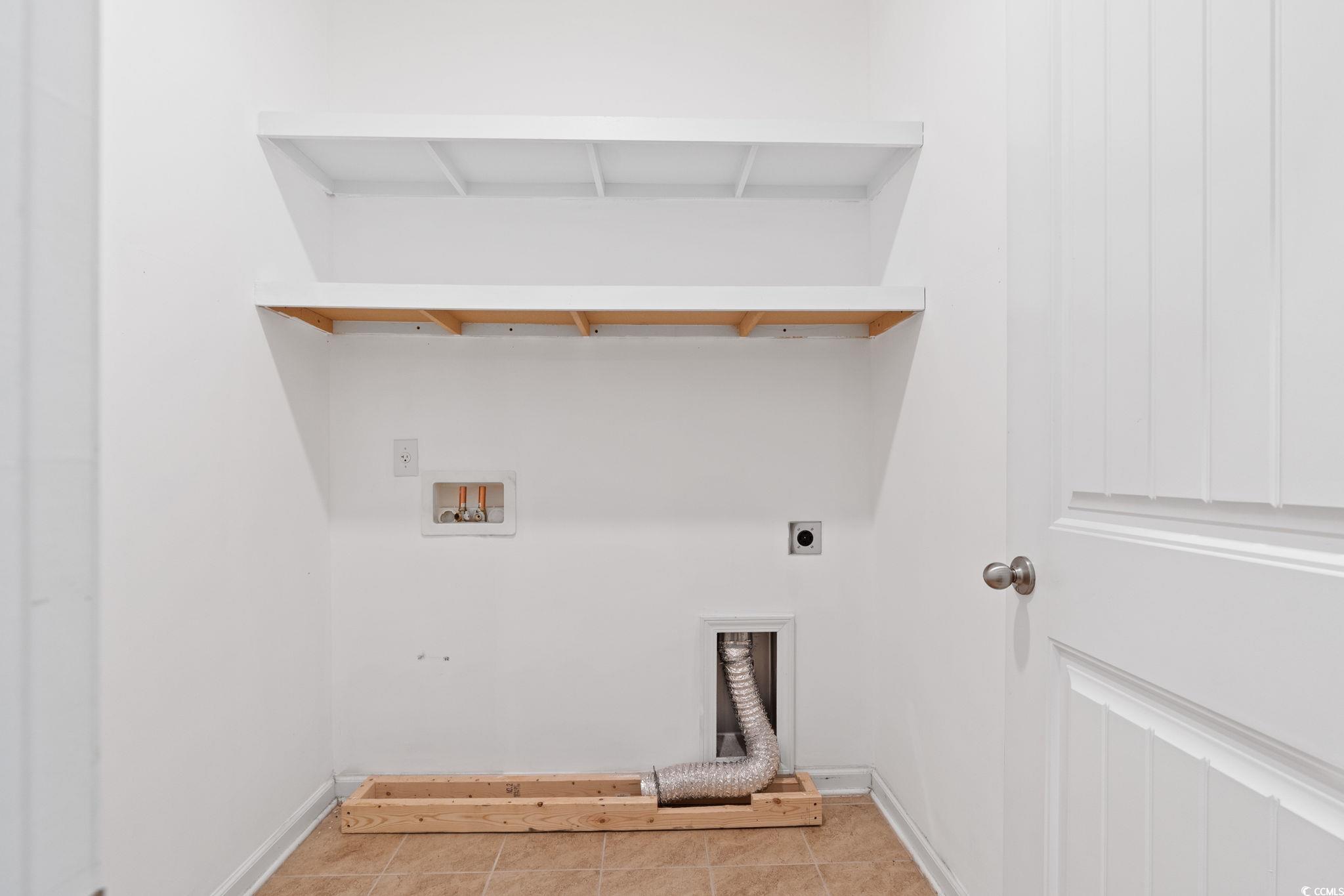 797 Salerno Circle, Unit C Myrtle Beach, SC 29579 - Photo 23 of 40 Washroom with hookup for a washing machine, light tile patterned floors, and electric dryer hookup