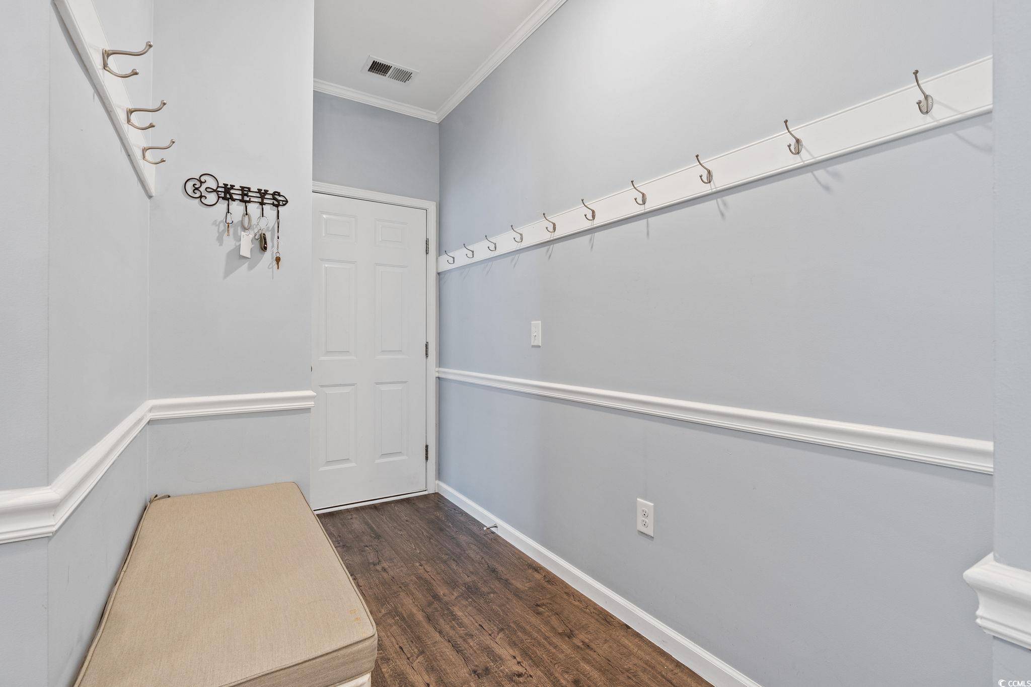 797 Salerno Circle, Unit C Myrtle Beach, SC 29579 - Photo 25 of 40 Mudroom with crown molding and dark wood-type flooring
