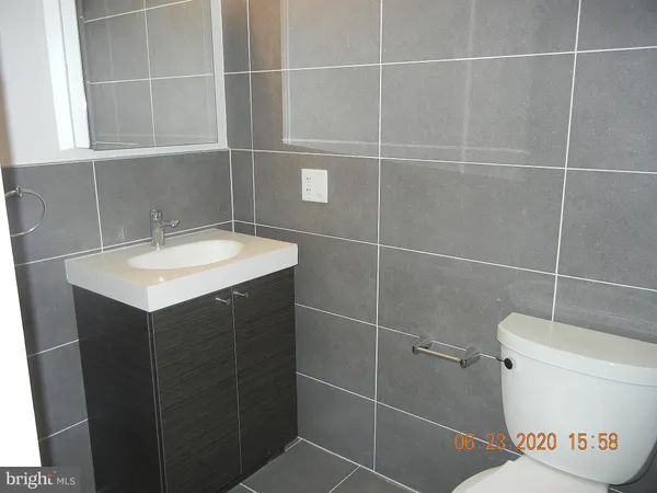 a view of a balcony with wooden floor and stairs