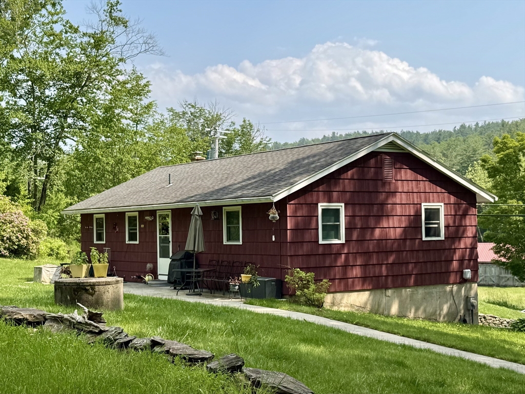 171 Haydenville Road Whately, MA 01093 - Photo 1 of 24 a view of a yard in front of house