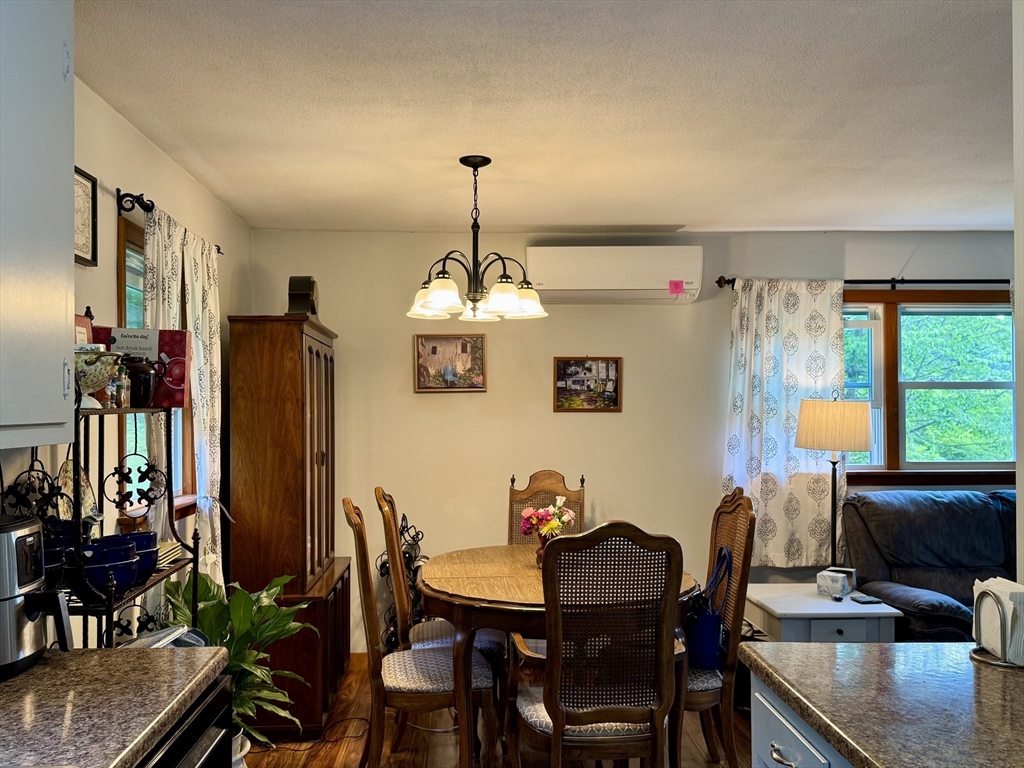 171 Haydenville Road Whately, MA 01093 - Photo 11 of 24 a view of a dining room with furniture and window