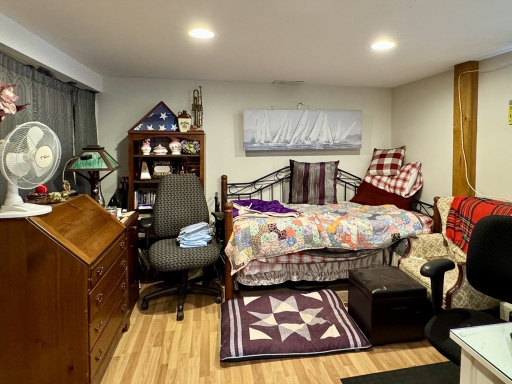 171 Haydenville Road Whately, MA 01093 - Photo 16 of 24 a bed sitting in a bedroom next to a window