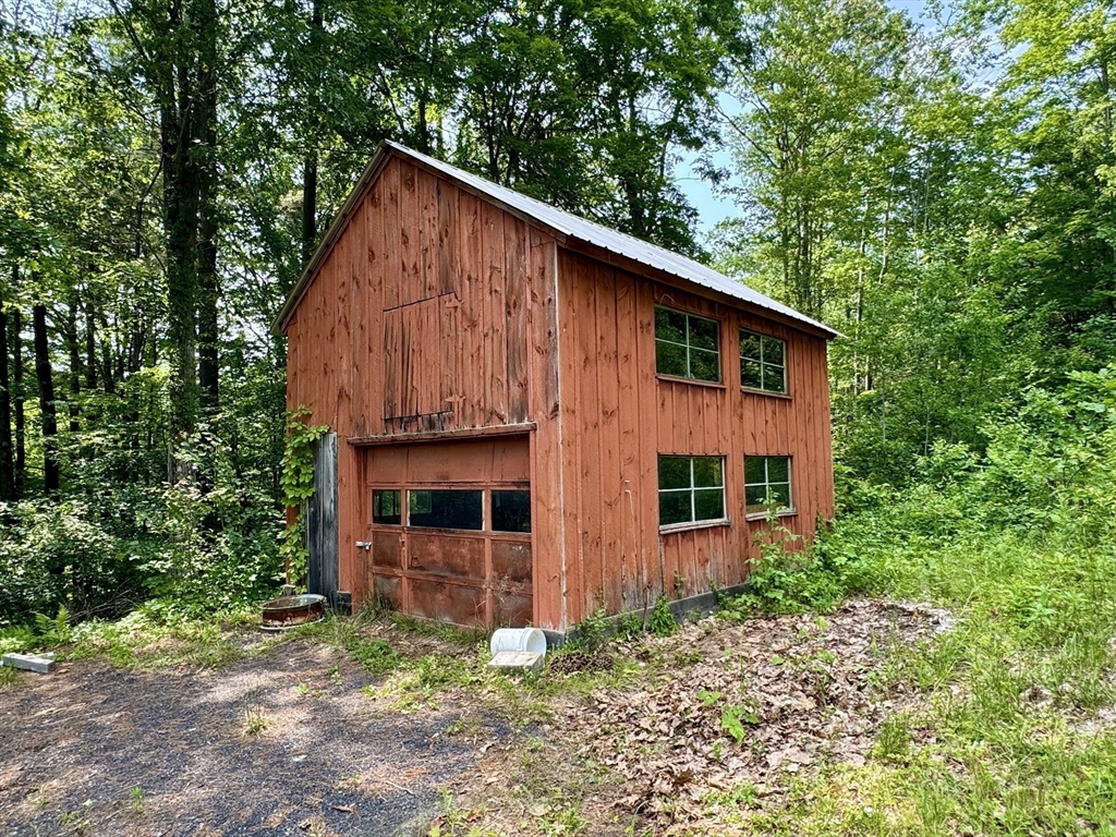 171 Haydenville Road Whately, MA 01093 - Photo 19 of 24 a view of a house with backyard and garden