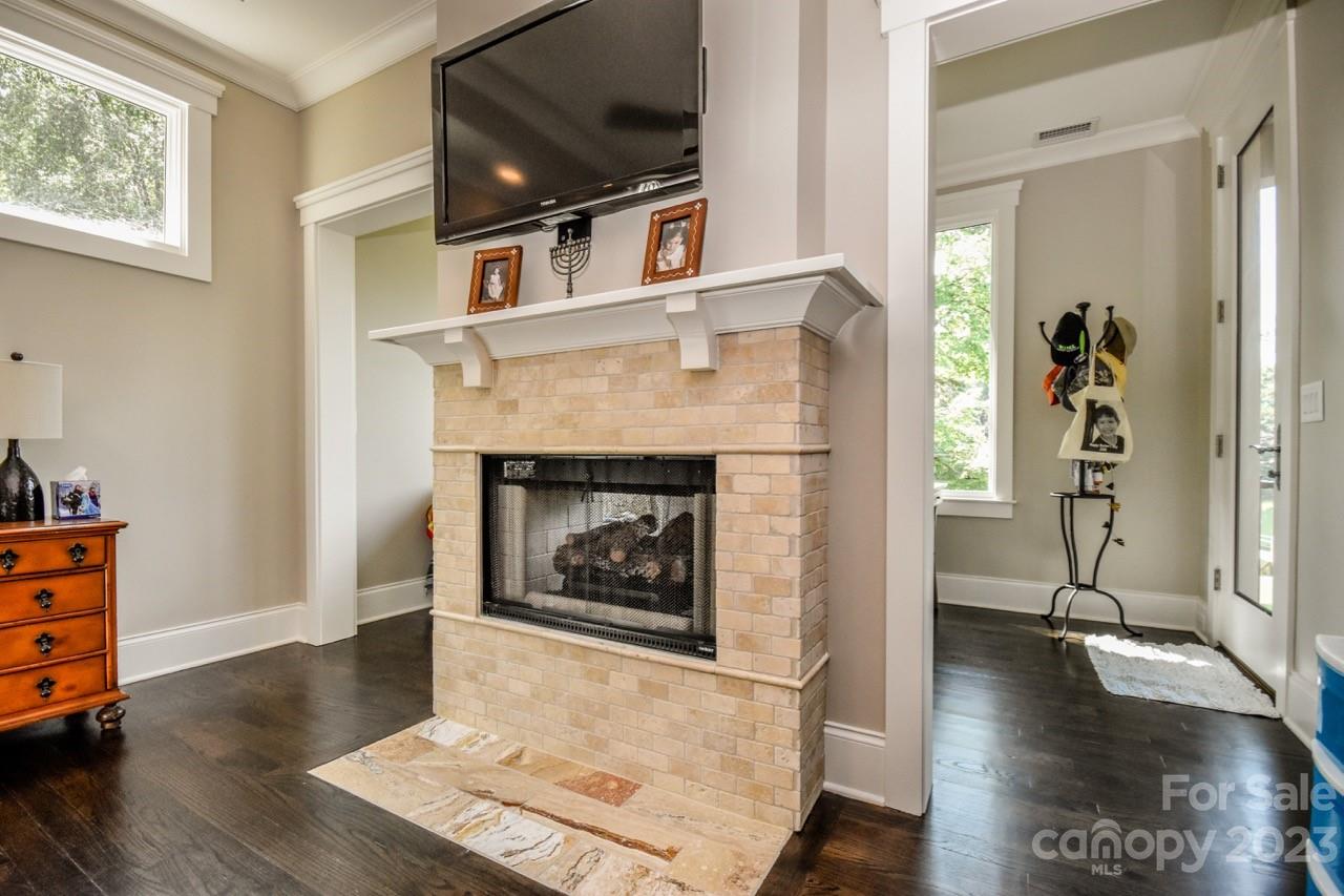 645 Kemp Road Mooresville, NC 28117 - Photo 14 of 48 a living room with furniture and a fireplace
