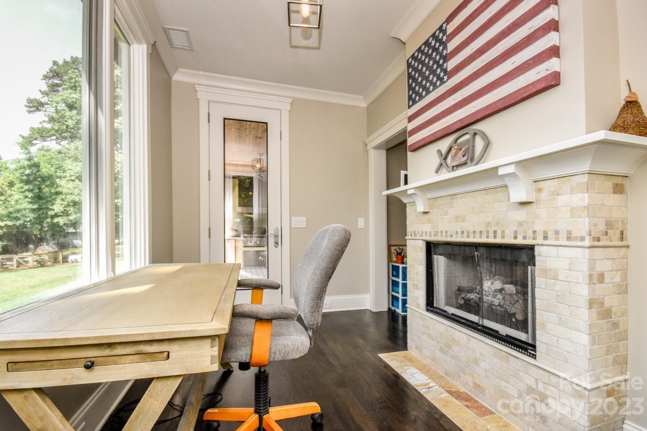 645 Kemp Road Mooresville, NC 28117 - Photo 19 of 48 a living room with furniture and a fireplace