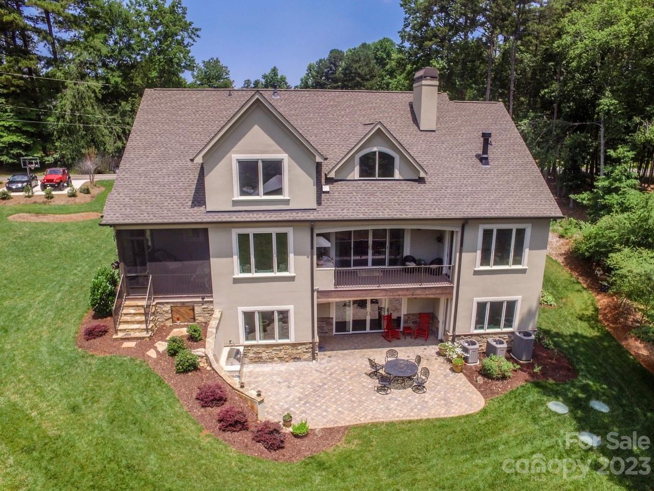 645 Kemp Road Mooresville, NC 28117 - Photo 2 of 48 a aerial view of a house with yard and green space