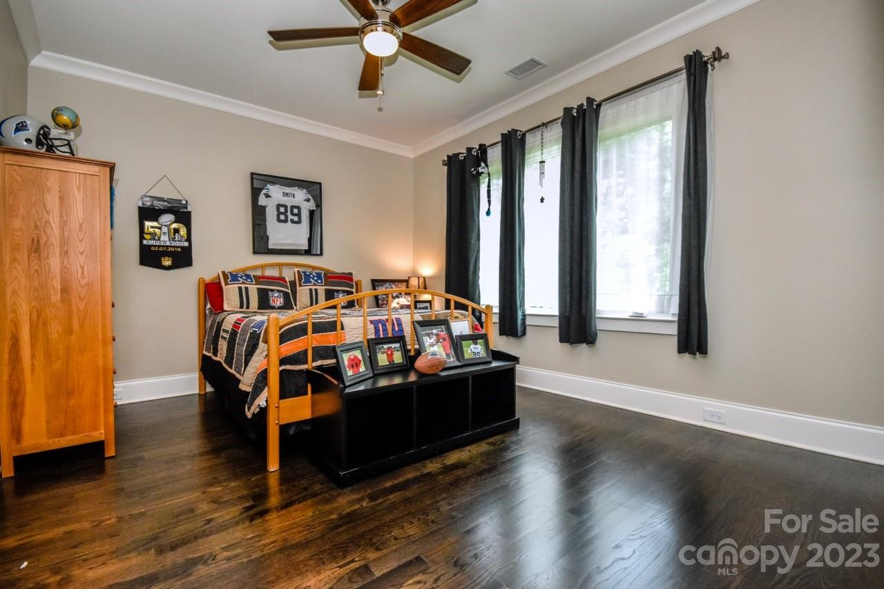 645 Kemp Road Mooresville, NC 28117 - Photo 24 of 48 a bedroom with furniture and window