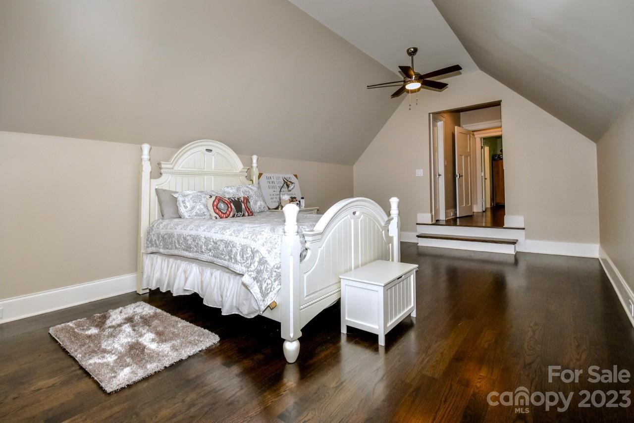 645 Kemp Road Mooresville, NC 28117 - Photo 27 of 48 a bedroom with a bed next to a window with outer view