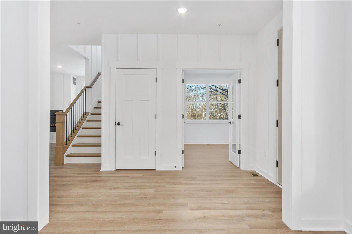 13935 Harrisville Road Mount Airy, MD 21771 - Photo 11 of 73 a view of entryway and hall with wooden floor