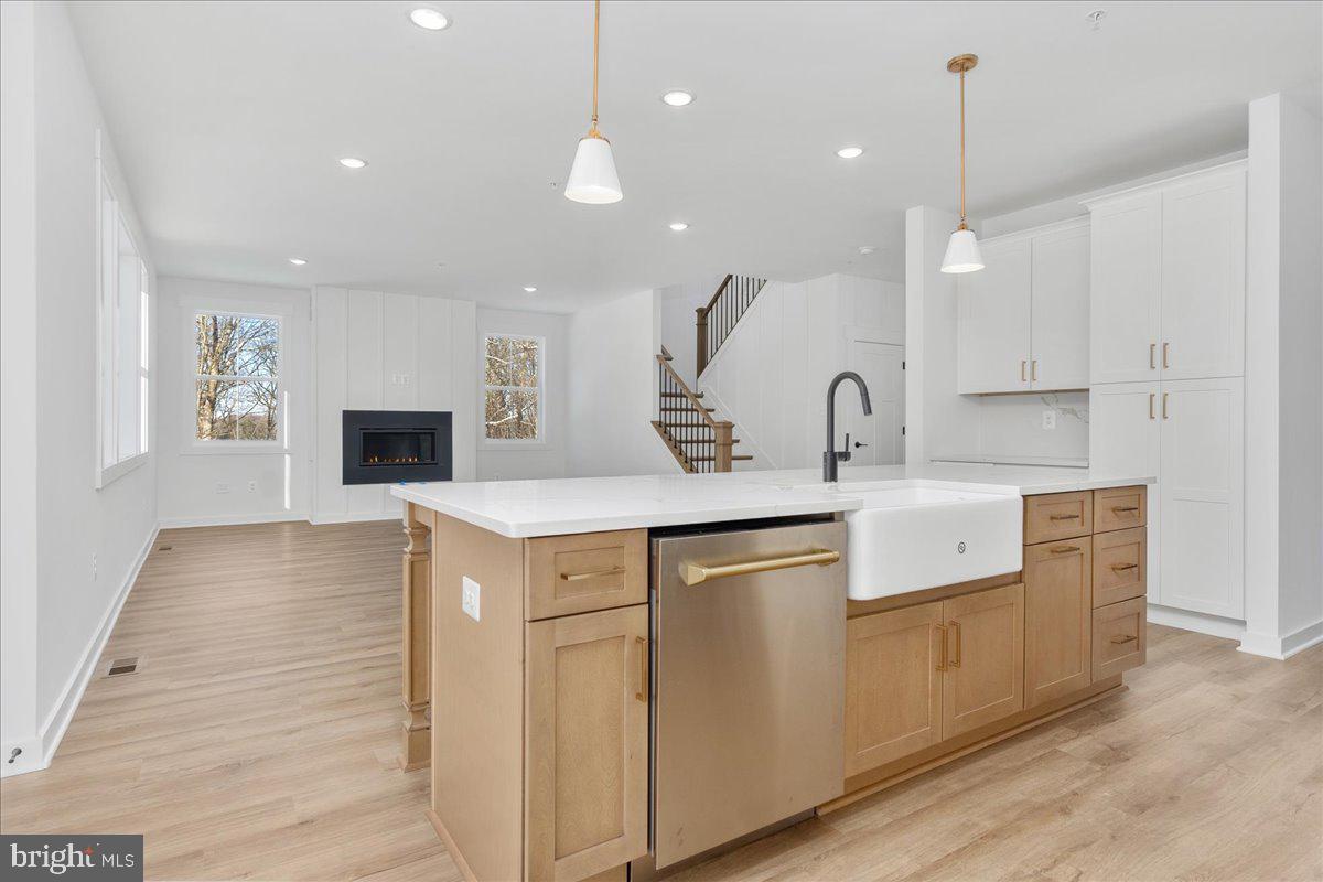 13935 Harrisville Road Mount Airy, MD 21771 - Photo 26 of 73 a kitchen with kitchen island a sink stainless steel appliances and a counter top