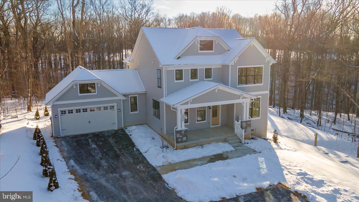 13935 Harrisville Road Mount Airy, MD 21771 - Photo 3 of 73 a front view of a house with a yard