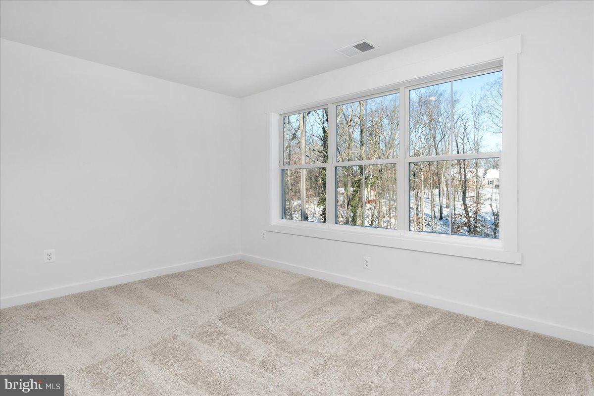 13935 Harrisville Road Mount Airy, MD 21771 - Photo 50 of 73 a view of an empty room with a window