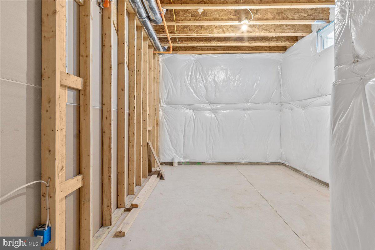 13935 Harrisville Road Mount Airy, MD 21771 - Photo 59 of 73 a view of a small room with wooden floor and a window