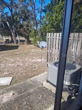 a view of a building with sitting area
