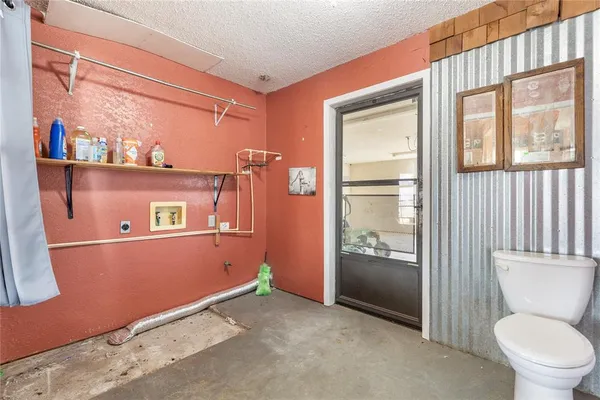 a bathroom with a toilet