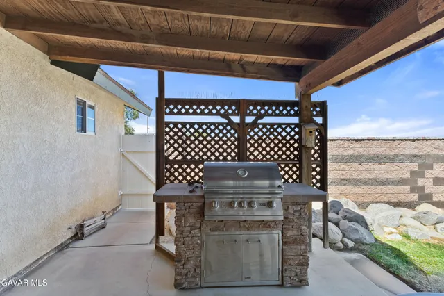 a view of a door with wooden floor