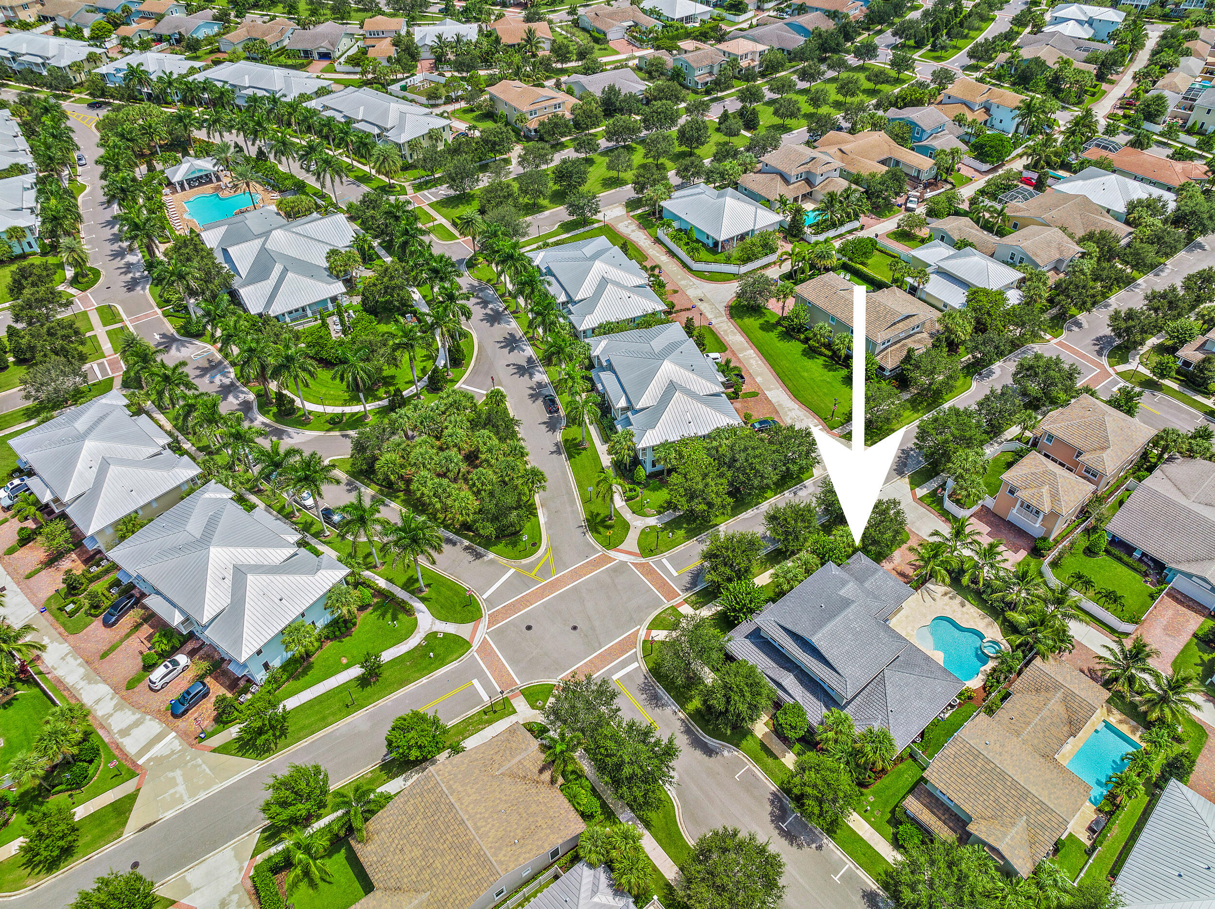 1342 Community Drive Jupiter, FL 33458 - Photo 29 of 34 Aerial View of House & Clubhouse