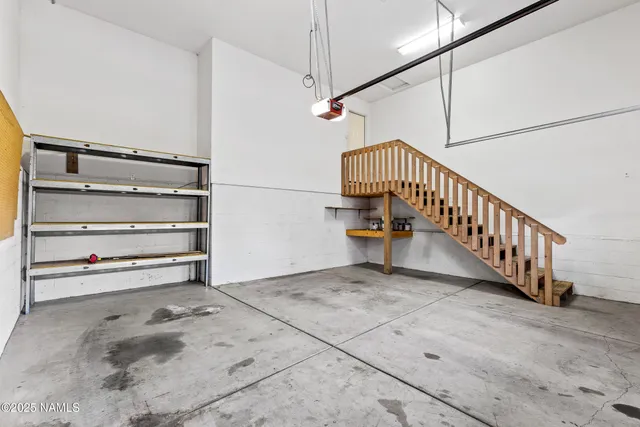 a view of a hallway with staircase