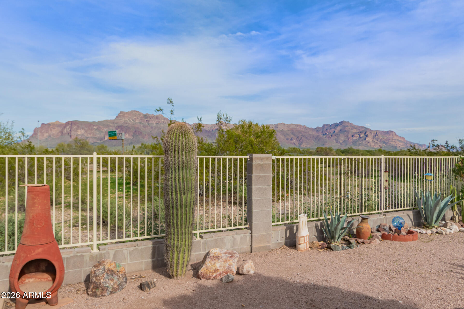 3301 South Goldfield Road, Unit 4028 Apache Junction, AZ 85119 - Photo 2 of 40 a view of a terrace with a water view