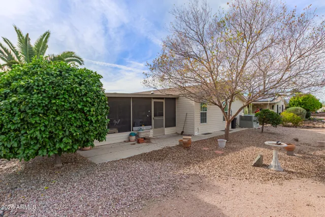 a view of a lake with a garden
