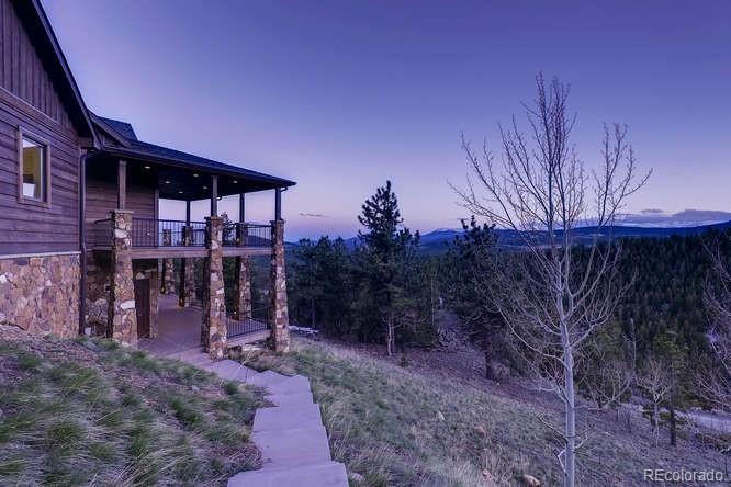 2 Dill Pickle Place Black Hawk, CO 80422 - Photo 11 of 39 a view of a house with a backyard