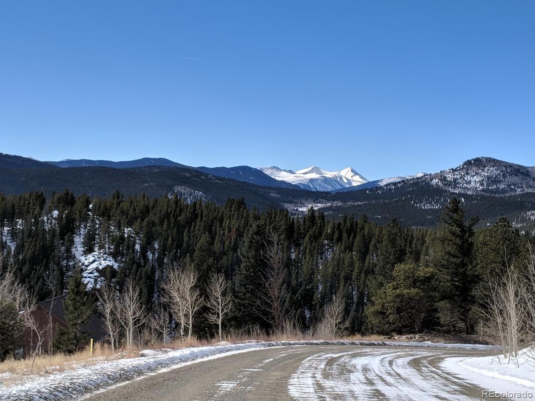 2 Dill Pickle Place Black Hawk, CO 80422 - Photo 32 of 39 a view of a street with a mountain in the background
