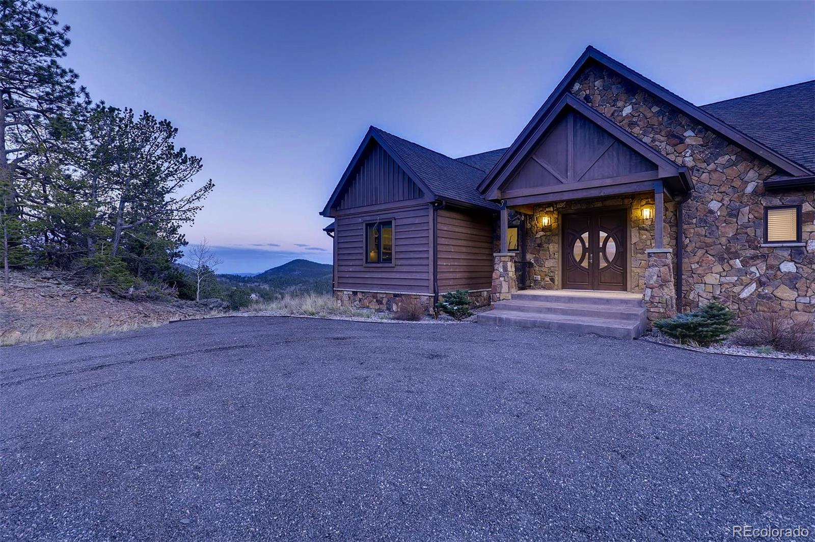 2 Dill Pickle Place Black Hawk, CO 80422 - Photo 6 of 39 a view of a house with a yard