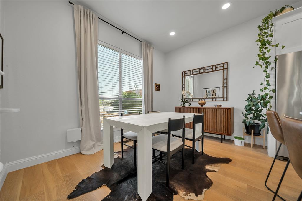 4317 Cedar Springs Road, Unit A Dallas, TX 75219 - Photo 17 of 27 a view of a livingroom with furniture and a potted plant