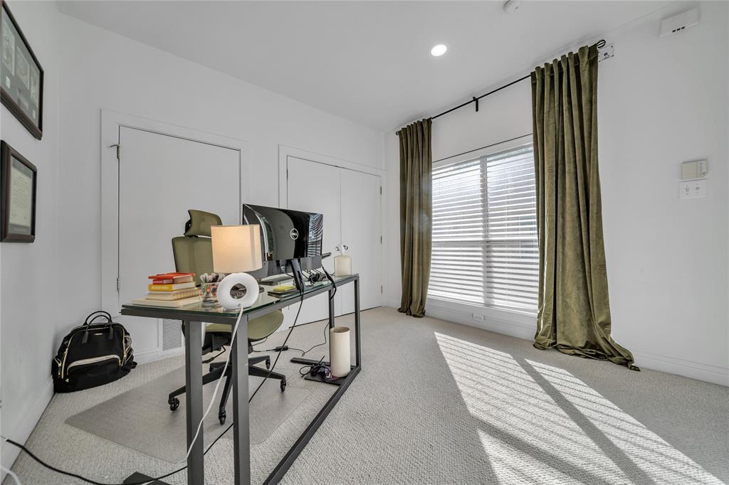 4317 Cedar Springs Road, Unit A Dallas, TX 75219 - Photo 18 of 27 a workspace with furniture and window