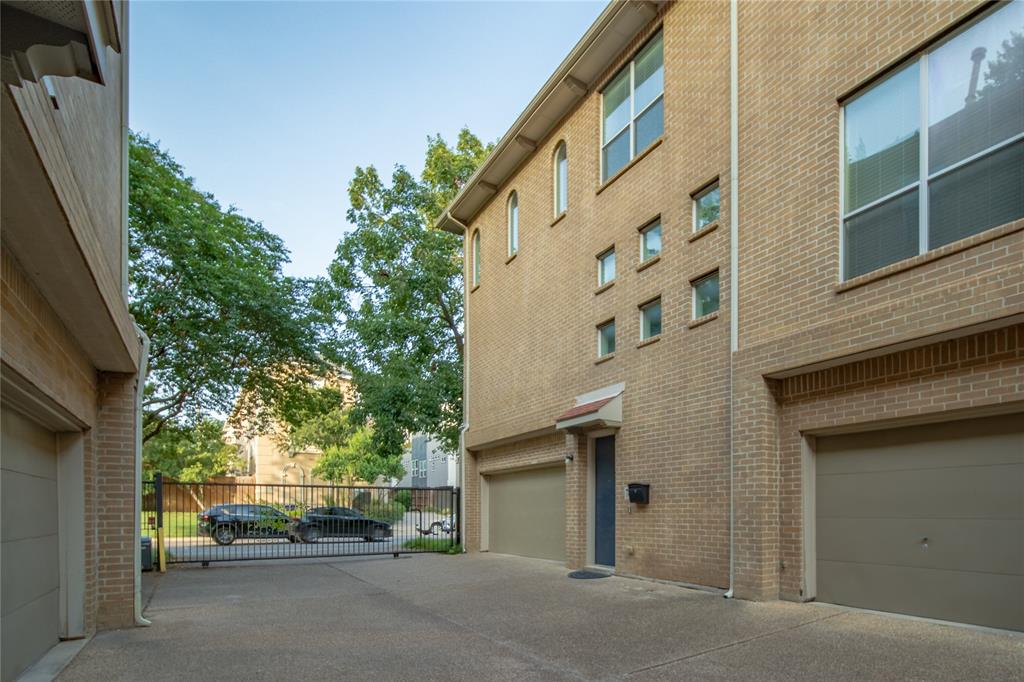 4317 Cedar Springs Road, Unit A Dallas, TX 75219 - Photo 21 of 27 a view of a car park in front of a building