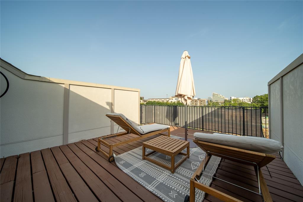 4317 Cedar Springs Road, Unit A Dallas, TX 75219 - Photo 23 of 27 a view of a balcony with furniture