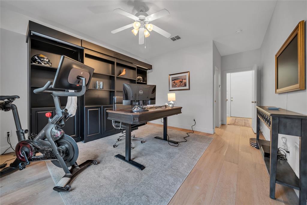 4317 Cedar Springs Road, Unit A Dallas, TX 75219 - Photo 8 of 27 a view of a room with gym equipment