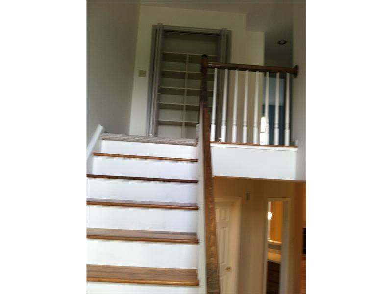 148 Shadow Ridge Drive, Unit 148 Pittsburgh, PA 15238 - Photo 3 of 25 1st Floor Plan. View upstairs from the front door....nice staircase!