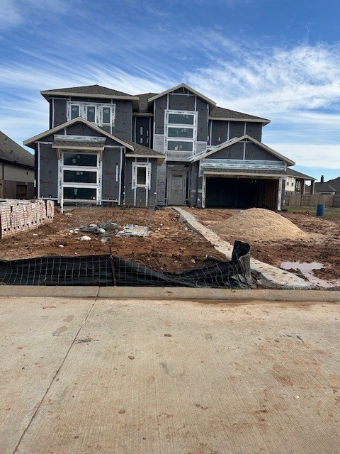 4510 Heather Crossing Road Fulshear, TX 77441 - Photo 2 of 7 a front view of a house with garage