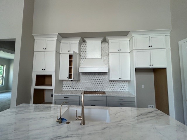 4510 Heather Crossing Road Fulshear, TX 77441 - Photo 3 of 7 a kitchen with stainless steel appliances granite countertop a stove and a refrigerator