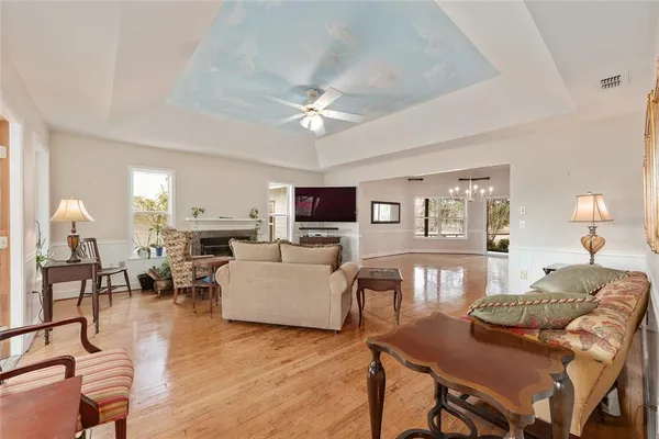 a kitchen with stainless steel appliances a stove a sink a refrigerator and cabinets