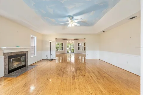 a kitchen with stainless steel appliances a stove a sink a refrigerator and cabinets