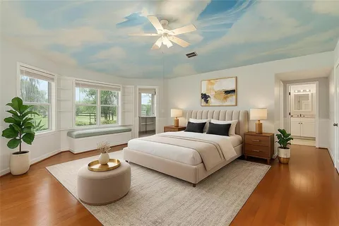 a bathroom with a granite countertop sink a mirror and a shower