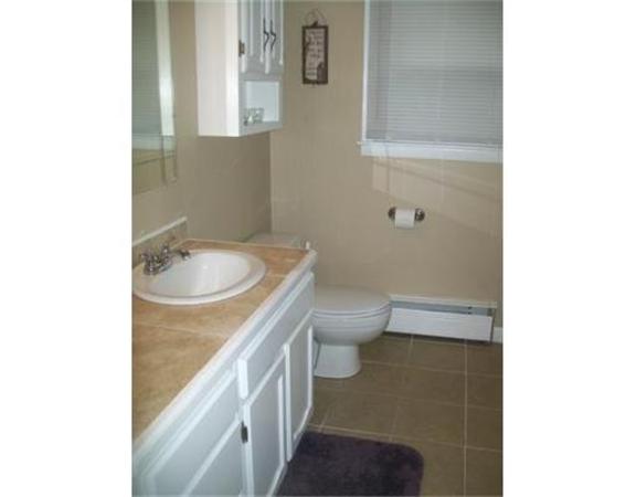 5 Fair Oak Road Springfield, MA 01128 - Photo 12 of 15 a bathroom with a granite countertop toilet and sink