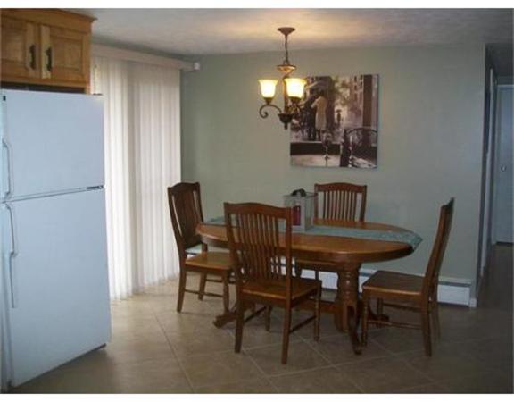 5 Fair Oak Road Springfield, MA 01128 - Photo 4 of 15 a view of a dining room with furniture and chandelier