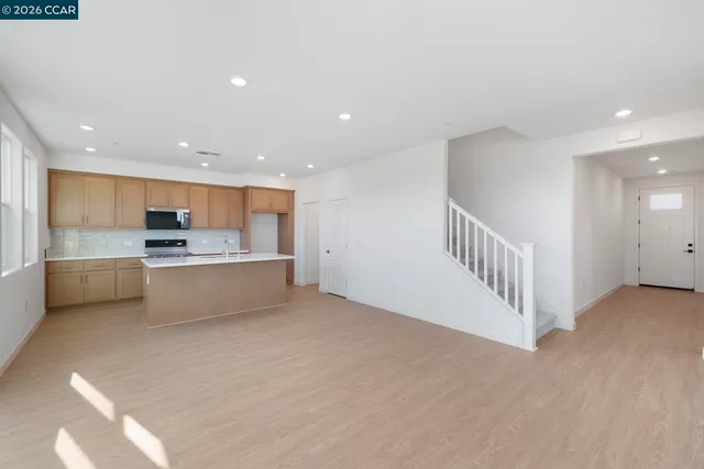 a view of a kitchen with a sink