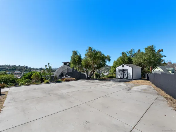 an aerial view of a house having yard